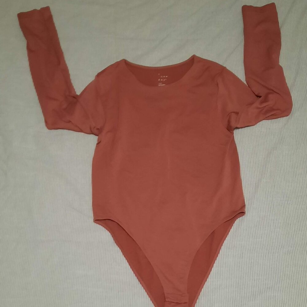 A new Day mauve Body Suit